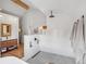 Modern bathroom with a walk-in shower, freestanding tub, and a sleek vanity at 3267 Stuart St, Denver, CO 80212