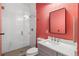 Bathroom with a walk-in shower and coral-colored walls at 3267 Stuart St, Denver, CO 80212