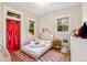 Cozy bedroom with a twin bed and whimsical decor at 3267 Stuart St, Denver, CO 80212