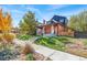 Charming brick home with updated exterior details and landscaping at 3267 Stuart St, Denver, CO 80212