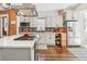 Modern kitchen with stainless steel appliances and an island at 3267 Stuart St, Denver, CO 80212