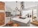 Modern kitchen with stainless steel appliances and an island at 3267 Stuart St, Denver, CO 80212