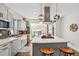 Modern kitchen with stainless steel appliances and an island at 3267 Stuart St, Denver, CO 80212