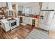 Modern kitchen with stainless steel appliances and an island at 3267 Stuart St, Denver, CO 80212