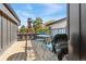 Relaxing rooftop deck with city views, metal railings, and small table at 3267 Stuart St, Denver, CO 80212