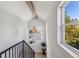 Bright hallway with exposed beams and natural light at 3267 Stuart St, Denver, CO 80212