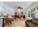 Bright and airy living room featuring hardwood floors, large windows, and neutral wall colors at 4650 S Laredo St, Aurora, CO 80015