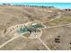 Aerial view of a park with playground, basketball court, and pavilion at 19011 W 84Th Ave, Arvada, CO 80007