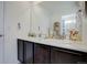 Double vanity bathroom with marble countertop at 19011 W 84Th Ave, Arvada, CO 80007