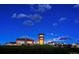 Night view of Leyden Rock community clubhouse and surrounding homes at 19011 W 84Th Ave, Arvada, CO 80007