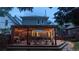 Backyard patio with pergola and string lights at dusk, creating a cozy atmosphere at 2823 N Lafayette St, Denver, CO 80205