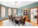 Dining room featuring hardwood floors, bay windows, and a beautiful chandelier at 2823 N Lafayette St, Denver, CO 80205