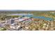 Panoramic aerial view of the city showcasing a mix of high-rise apartments and single-Gathering homes near Sloan's Lake at 1287 Quitman St, Denver, CO 80204