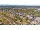 Stunning aerial view of the neighborhood showcasing a mix of residential and commercial properties near Sloan's Lake at 1287 Quitman St, Denver, CO 80204