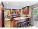 Beautiful kitchen with granite countertops, stainless steel appliances, and breakfast bar at 7881 S Ivy Ct, Centennial, CO 80112