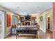Modern living room with a fireplace, neutral walls, and hardwood floors at 7881 S Ivy Ct, Centennial, CO 80112