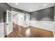 Inviting office space with french doors, wood floors, and wainscoting at 8523 S Flower Ct, Littleton, CO 80128