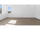 Bright, empty bedroom with wood floors and a window at 5625 W 141St Ln, Broomfield, CO 80020