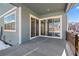 Covered patio featuring a sliding glass door, perfect for outdoor entertaining and relaxation at 5625 W 141St Ln, Broomfield, CO 80020