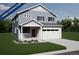 Two-story home with gray siding, red door, and two-car garage at 3948 N Riviera Ct, Aurora, CO 80019