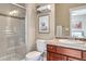 Bathroom with shower, toilet and wood vanity at 33100 Ridgeview Loop, Elizabeth, CO 80107