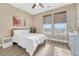 Bedroom with wood-look floors and large windows at 33100 Ridgeview Loop, Elizabeth, CO 80107