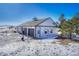 Detached garage with basketball court, snow on ground at 33100 Ridgeview Loop, Elizabeth, CO 80107