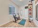 Basement home gym with stationary bike, weights, and mirror at 33100 Ridgeview Loop, Elizabeth, CO 80107