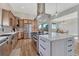 Modern kitchen with an island, stainless steel appliances, and ample cabinetry at 33100 Ridgeview Loop, Elizabeth, CO 80107