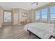 Main bedroom with hardwood floors and large windows at 33100 Ridgeview Loop, Elizabeth, CO 80107