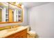 Bathroom with a marbled sink and vanity at 4730 Pierce St, Wheat Ridge, CO 80033