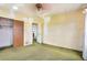Bedroom with closet and outdated carpet in a home that needs updating at 4730 Pierce St, Wheat Ridge, CO 80033