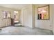Entryway with closet, stairway and view to dining room at 4730 Pierce St, Wheat Ridge, CO 80033