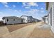 New home community featuring modern homes in various colors at 45934 Gentry Ave, Bennett, CO 80102
