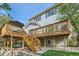 Home's multi-level deck overlooks a well-manicured backyard, perfect for outdoor enjoyment at 13723 Milwaukee Ct, Thornton, CO 80602