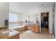 Bright bathroom featuring granite countertops, tile flooring, and a soaking tub at 13723 Milwaukee Ct, Thornton, CO 80602