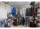 Well-organized walk-in closet with ample storage and metal shelving at 13723 Milwaukee Ct, Thornton, CO 80602