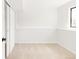 Bright bedroom featuring neutral carpet and a large closet at 10024 Holland Ct, Broomfield, CO 80021