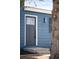 A closer view of the inviting entryway, showing the front door and address numbers on the exterior at 10024 Holland Ct, Broomfield, CO 80021