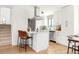 Contemporary kitchen features a bright and spacious open concept with stainless appliances and modern finishes at 10024 Holland Ct, Broomfield, CO 80021