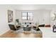Bright and spacious living room features lots of natural light and modern decor at 10024 Holland Ct, Broomfield, CO 80021