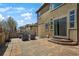 A spacious backyard patio offering ample room for outdoor furniture at 1204 S Balsam Ct, Lakewood, CO 80232