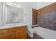 Stylish bathroom with marble vanity, walk-in shower, and updated fixtures enhancing your daily routine at 1204 S Balsam Ct, Lakewood, CO 80232