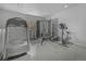 Well-equipped exercise room with a treadmill, weight machine, and stationary bike at 1204 S Balsam Ct, Lakewood, CO 80232