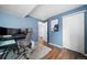 Bright office space features wood floors, great lighting, multiple monitors, and closet space for optimal organization at 1482 S Pitkin Cir, Aurora, CO 80017