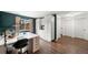 Spacious home office featuring hardwood floors, custom shelving and a large work area with great natural light at 1482 S Pitkin Cir, Aurora, CO 80017