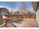 Inviting wooden deck providing an outdoor space with backyard views and plenty of room for outdoor seating at 1188 Mulberry Ln, Highlands Ranch, CO 80129