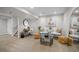 Finished basement featuring stylish décor, seating, and a unique clock at 1188 Mulberry Ln, Highlands Ranch, CO 80129