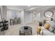 Spacious finished basement with bar seating, a play tent, and modern décor at 1188 Mulberry Ln, Highlands Ranch, CO 80129