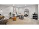 Cozy finished basement with modern décor, including seating and a decorative wall mirror at 1188 Mulberry Ln, Highlands Ranch, CO 80129